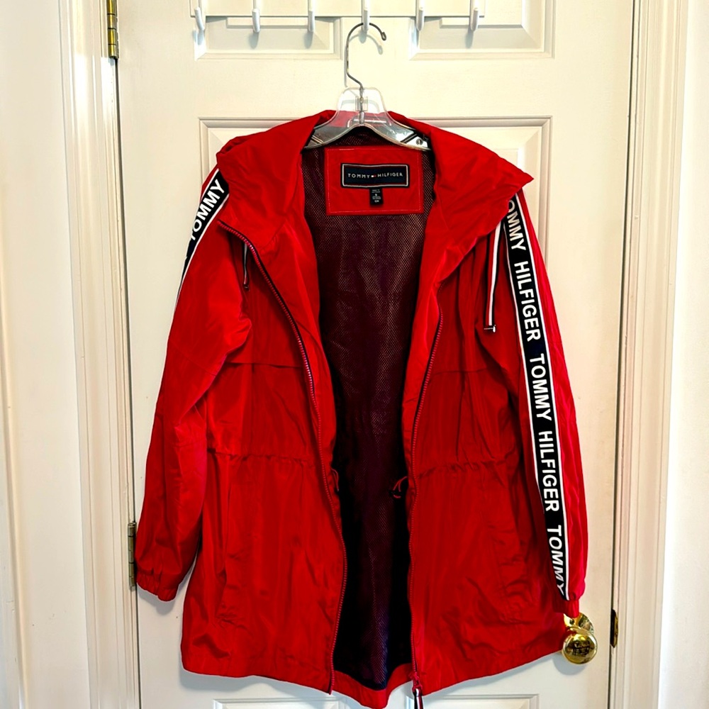 Tommy Hilfiger size small red women’s rain jacket with hood.